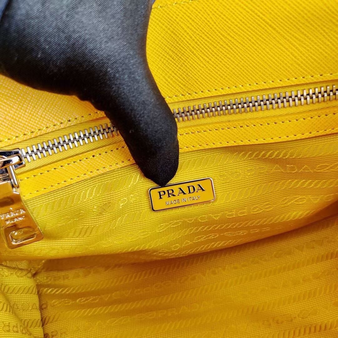 Pra*a galleria micro bag in yellow saffiano leather
