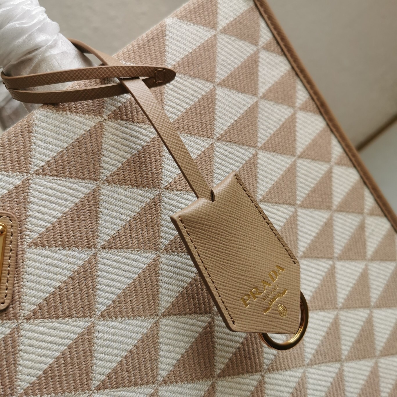 Pra*a symbole small bag in beige and white jacquard fabric