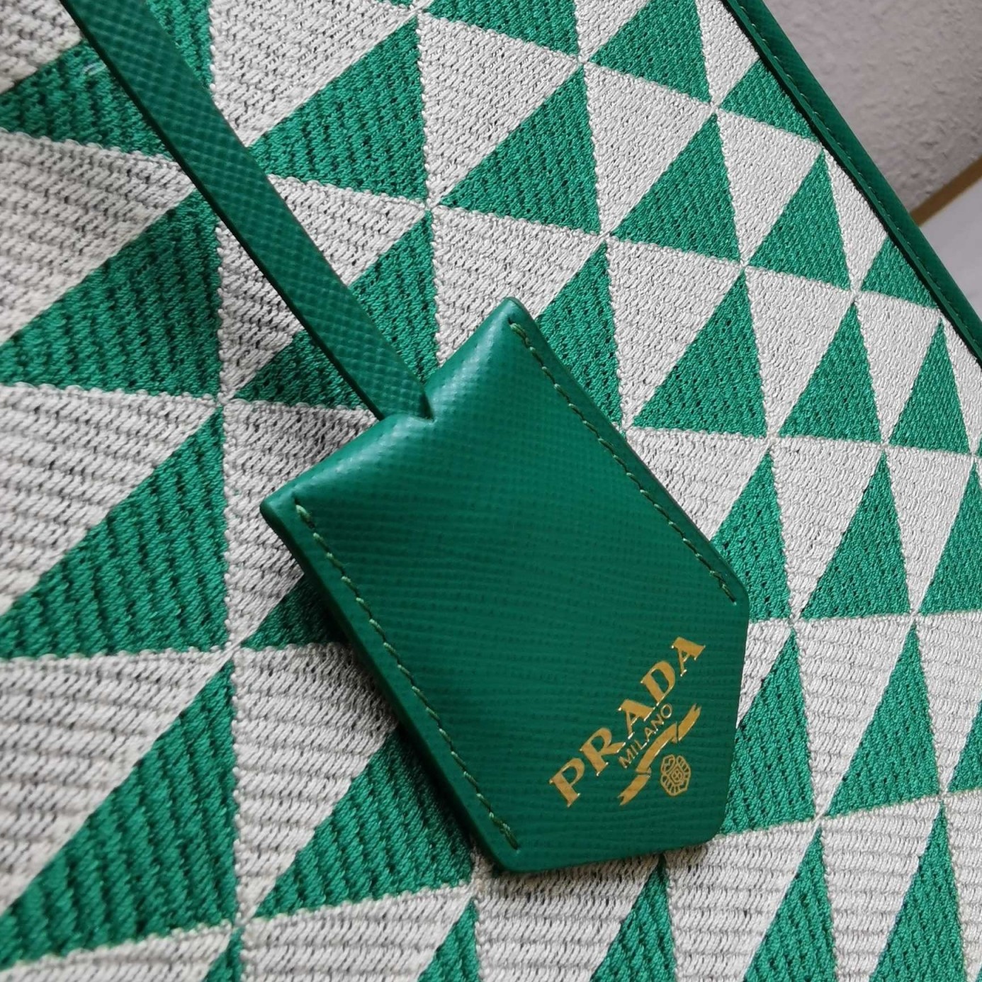 Pra*a symbole large bag in green and white jacquard fabric