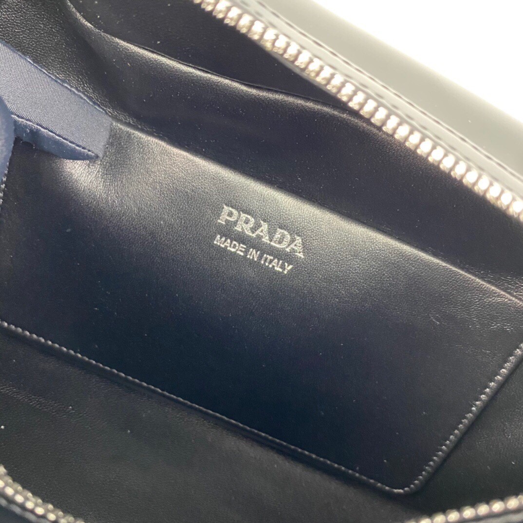 pra*a S*pernova medium handbag in black brushed leather