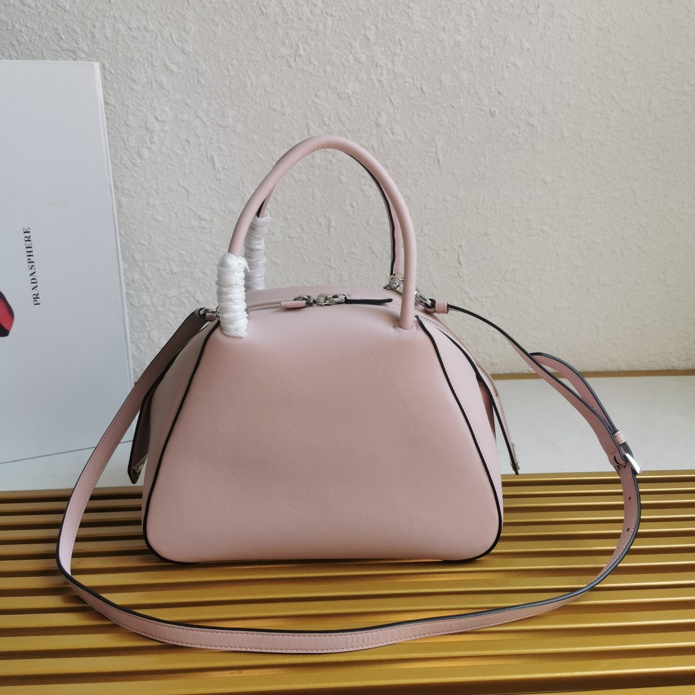 pra*a S*pernova small handbag in pink leather
