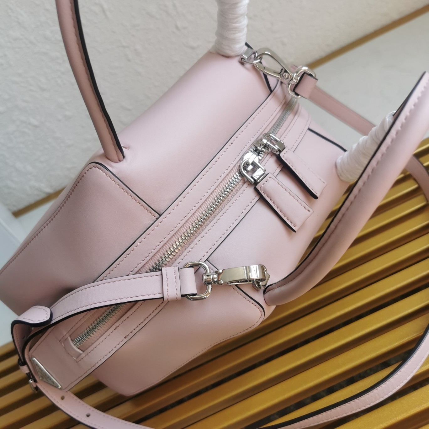 pra*a S*pernova small handbag in pink leather