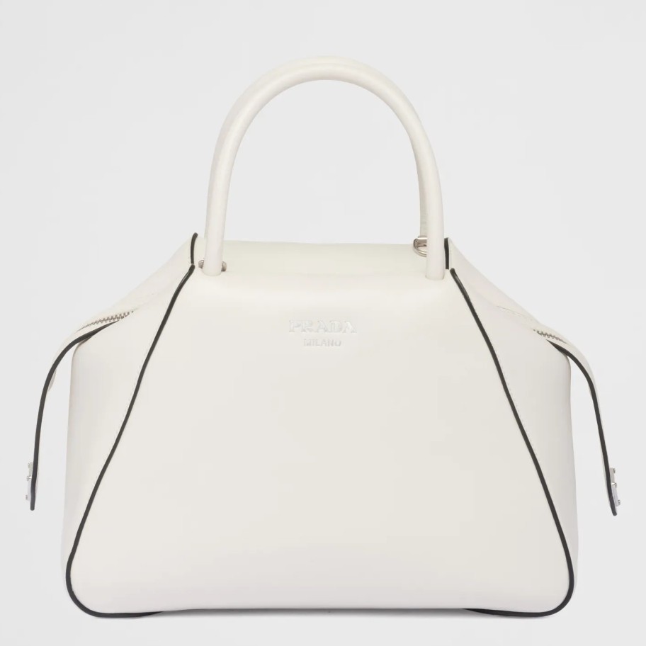 pra*a S*pernova small handbag in white leather