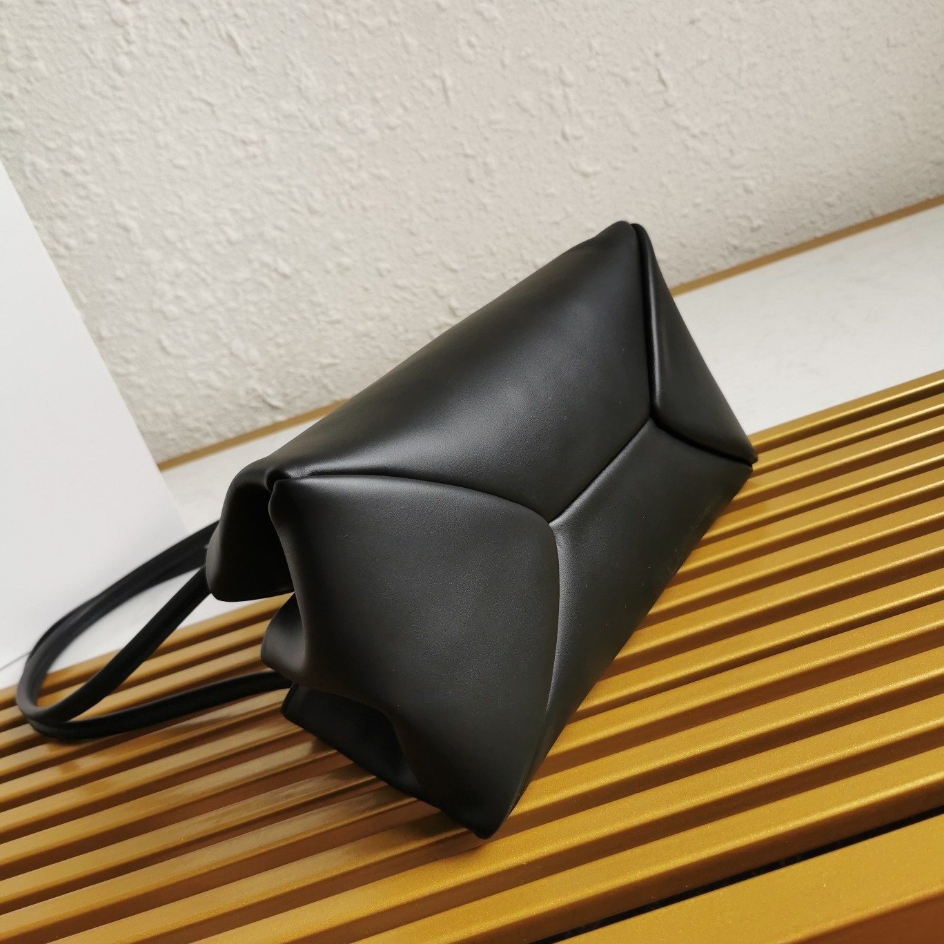 pra*a S*pernova small shoulder bag in black leather