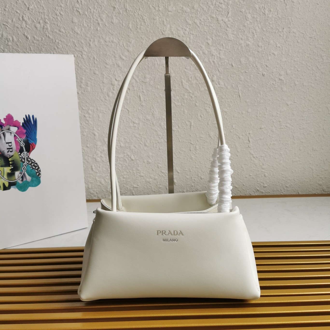 pra*a S*pernova small shoulder bag in white leather