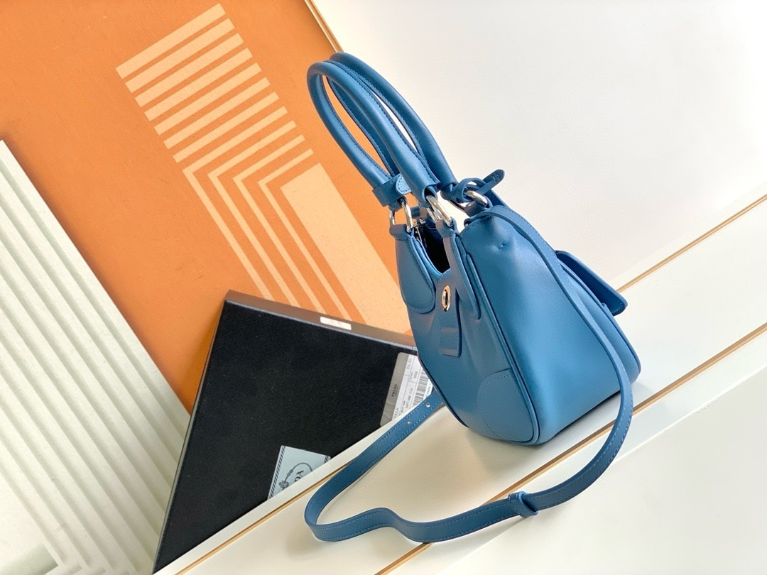 Pra*a moon bag in blue padded nappa leather