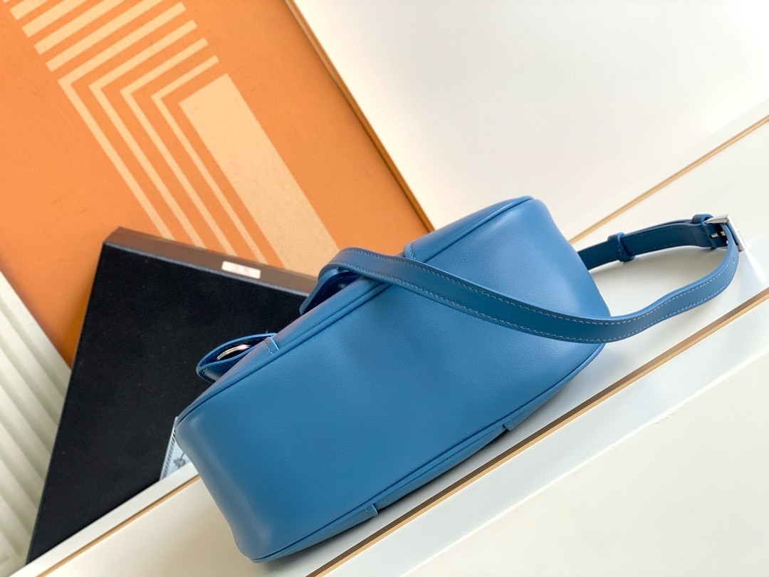 Pra*a moon bag in blue padded nappa leather