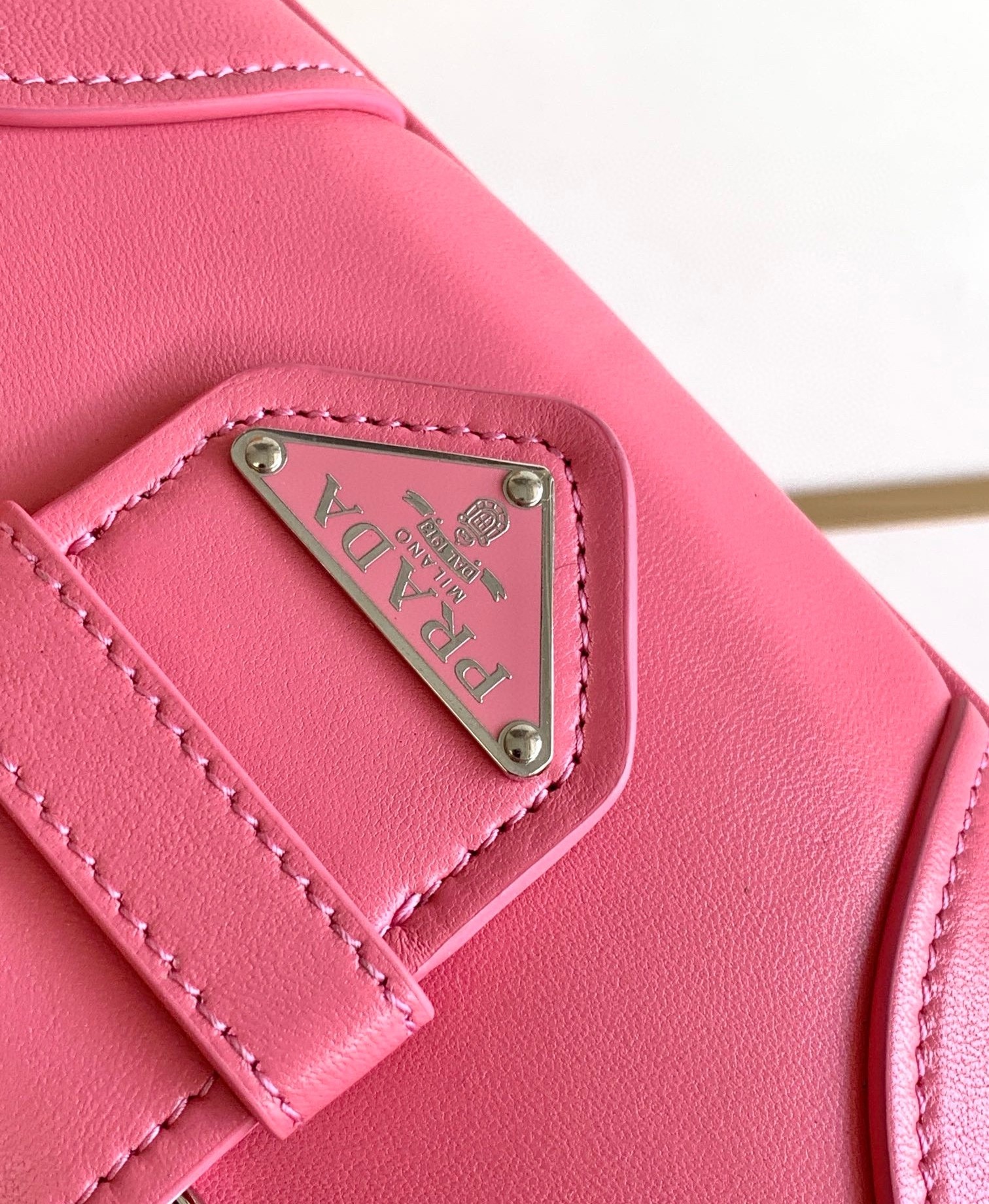 Pra*a moon bag in pink padded nappa leather