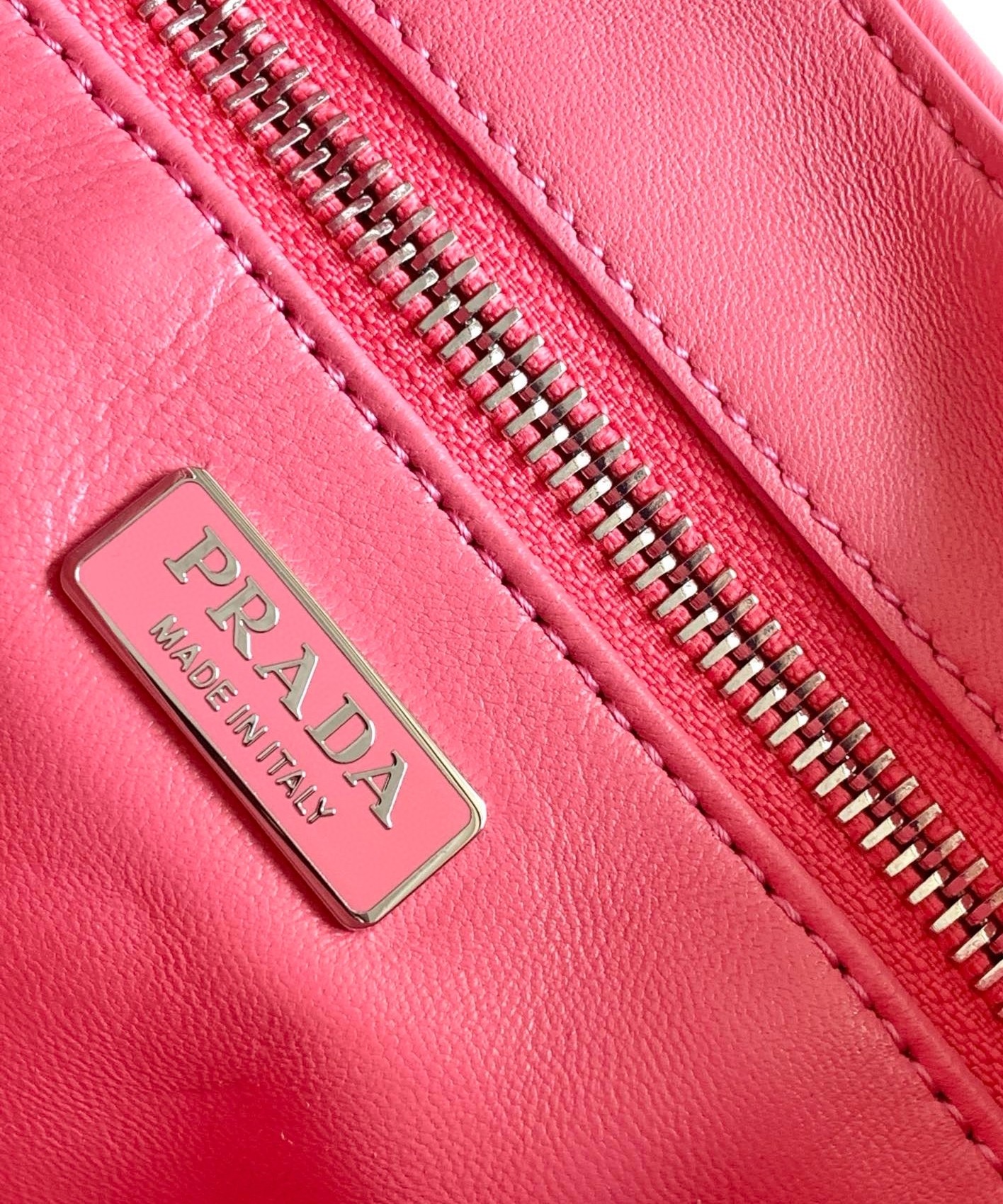 Pra*a moon bag in pink padded nappa leather