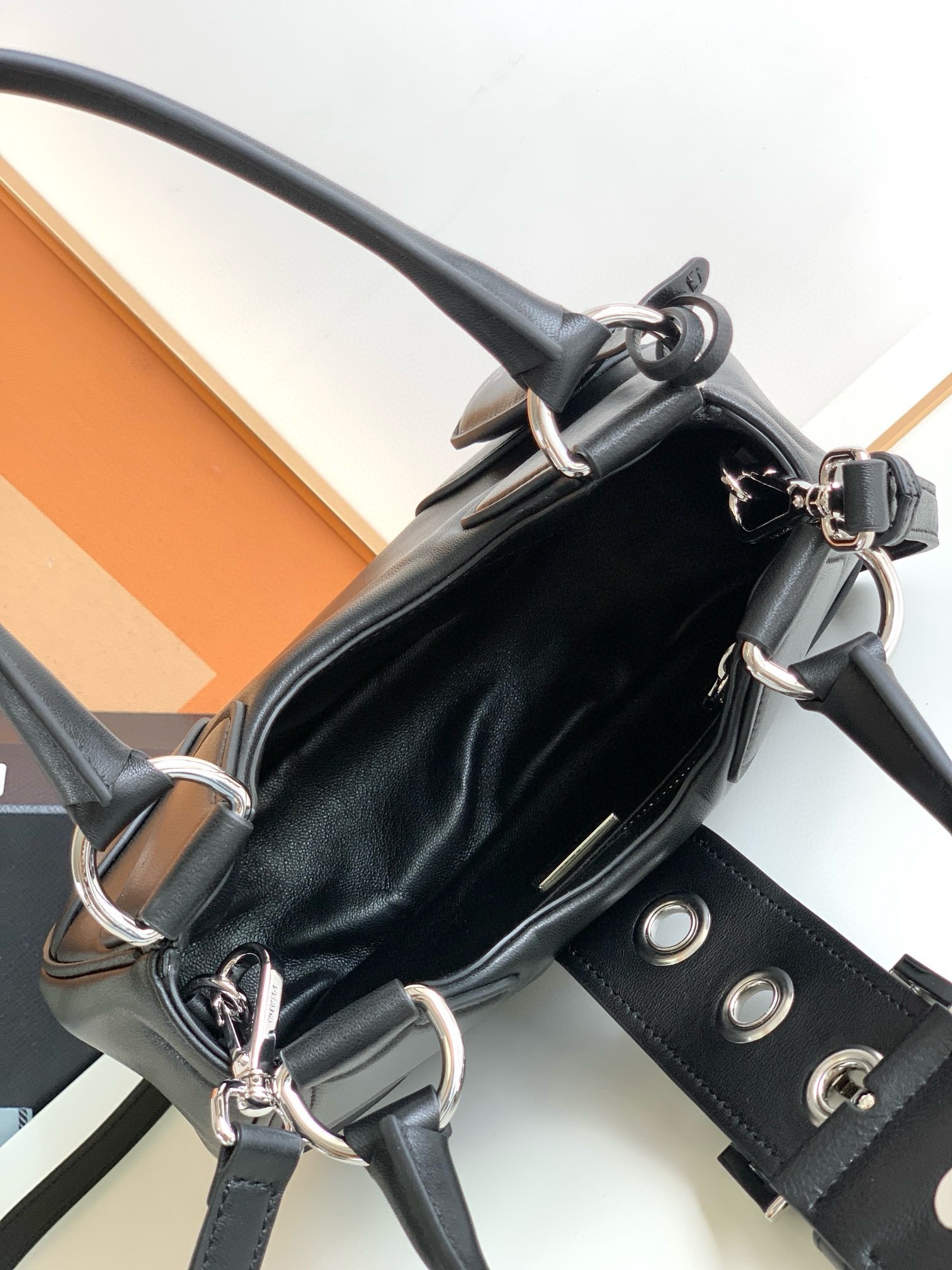 Pra*a moon bag in black re-nylon and leather