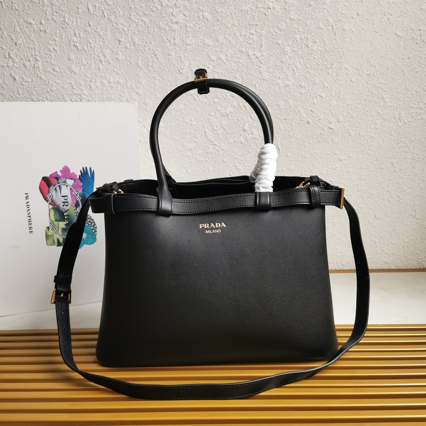 Pra*a buckle medium bag with double belt in black leather