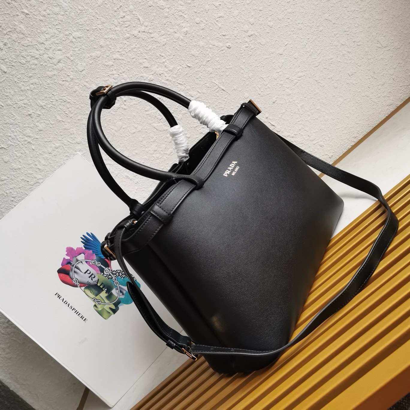 Pra*a buckle medium bag with double belt in black leather