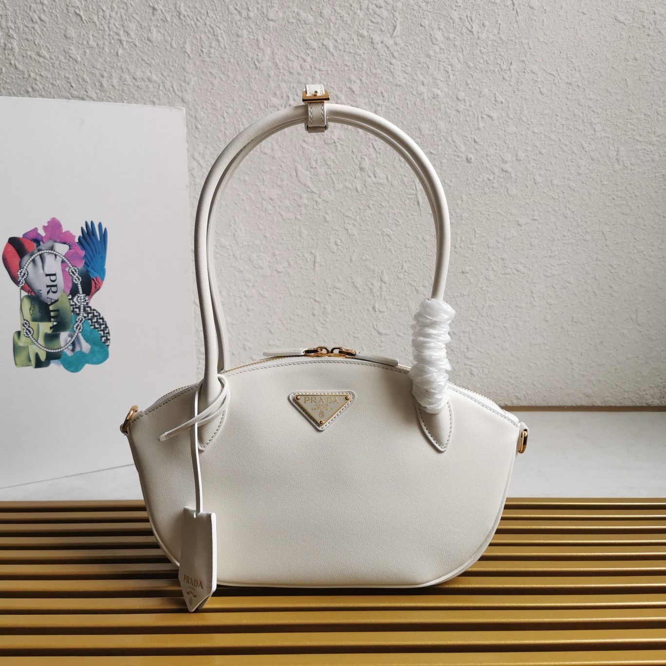 Pra*a shoulder bag with double zipper in white calfskin