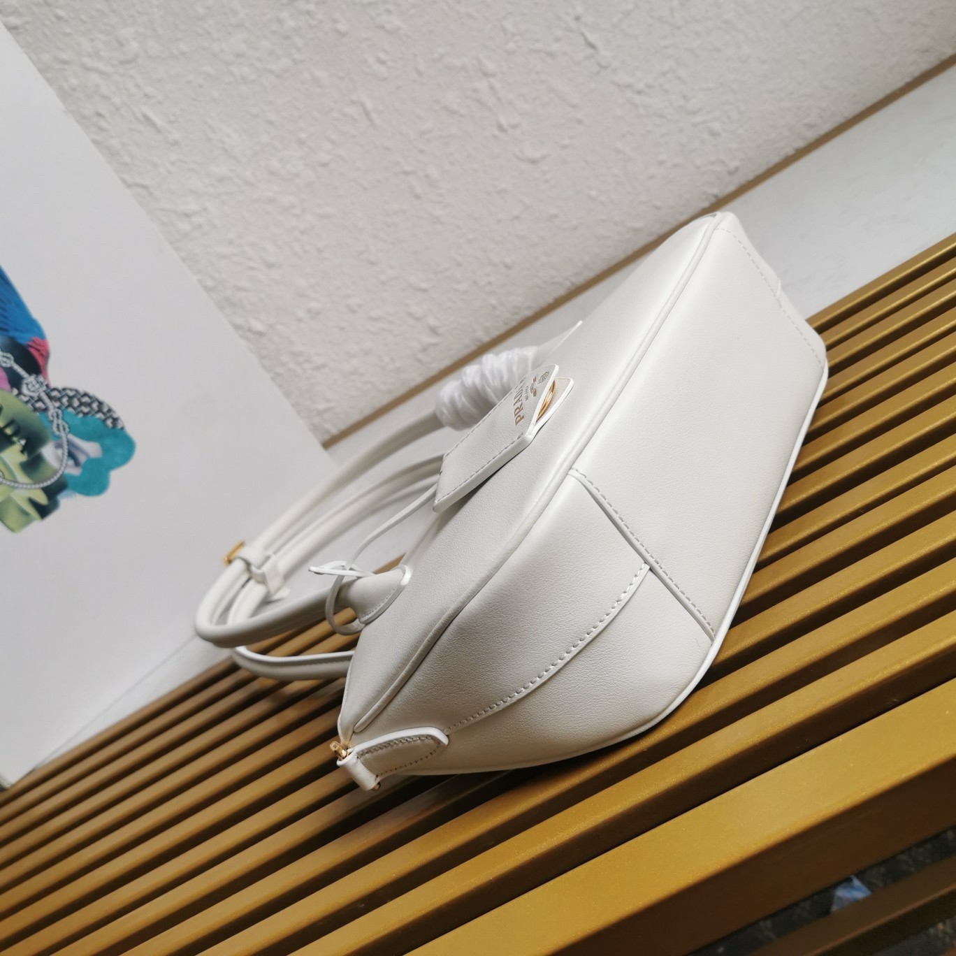Pra*a shoulder bag with double zipper in white calfskin