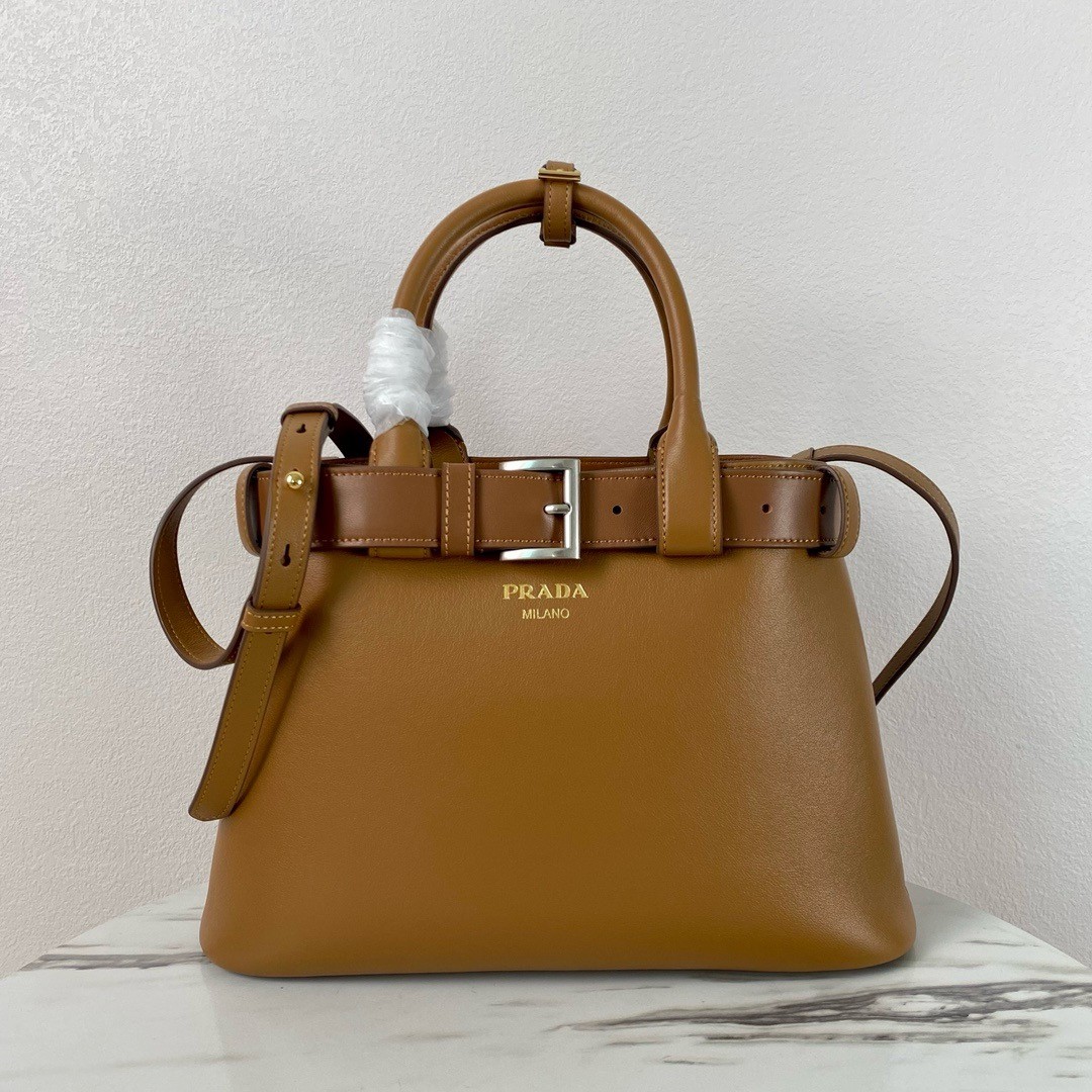 Pra*a buckle medium bag with belt in brown leather