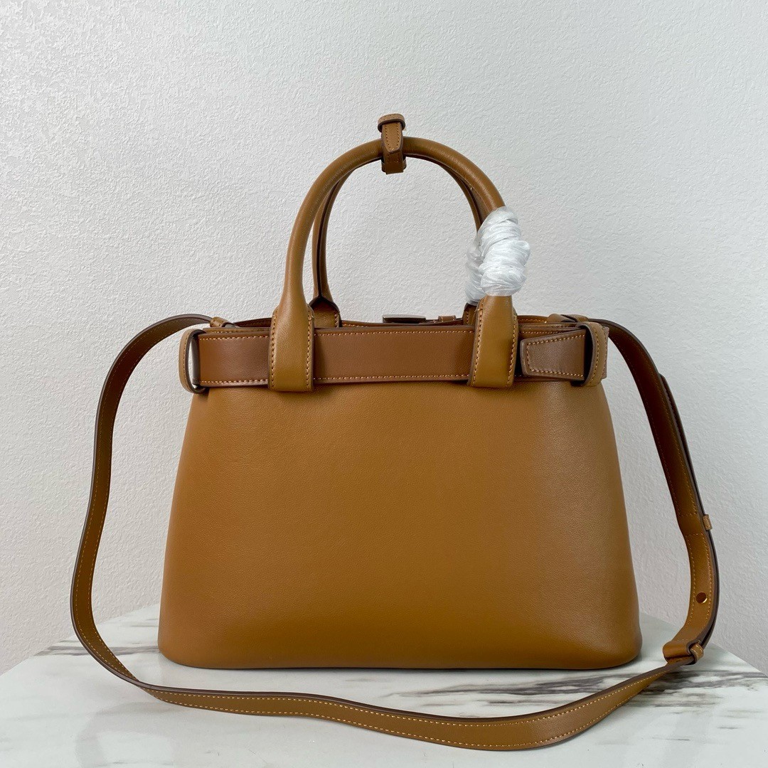 Pra*a buckle medium bag with belt in brown leather