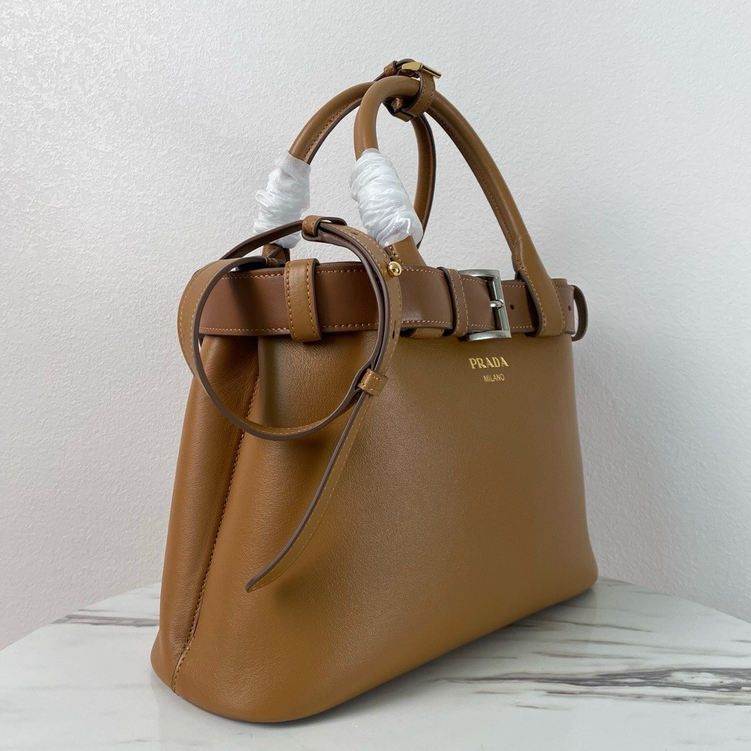 Pra*a buckle medium bag with belt in brown leather