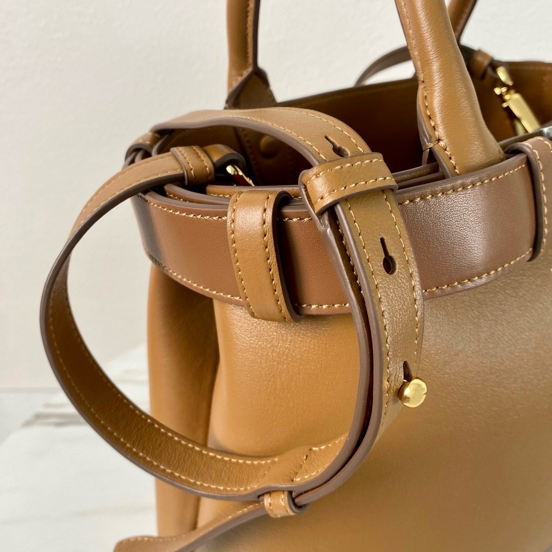 Pra*a buckle medium bag with belt in brown leather