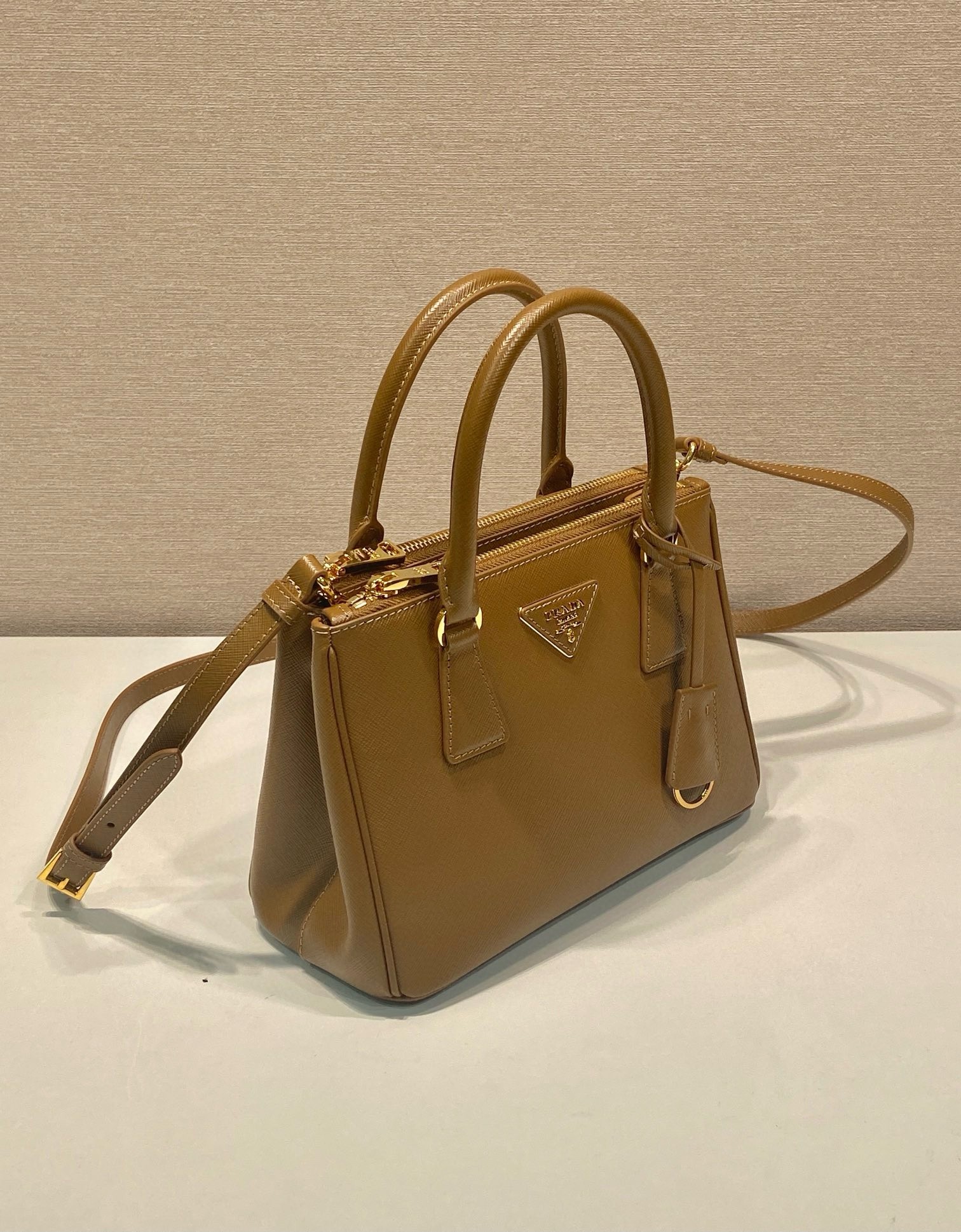 Pra*a galleria small bag in caramel saffiano leather