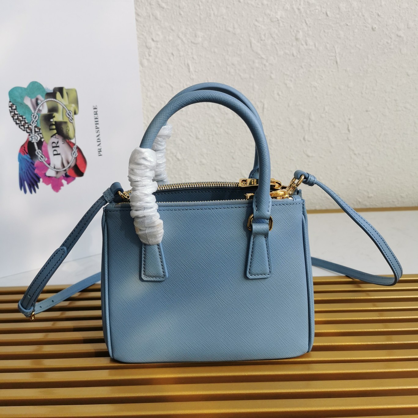 Pra*a mini galleria bag in light blue saffiano leather