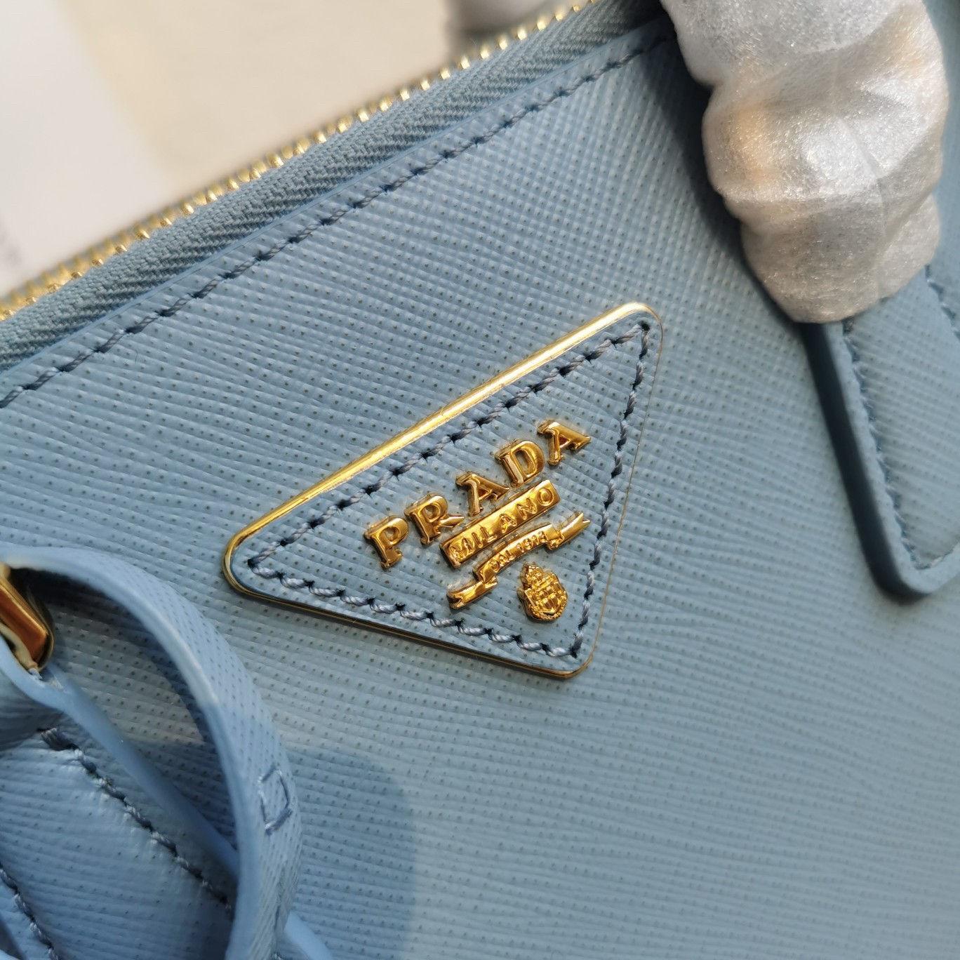Pra*a mini galleria bag in light blue saffiano leather