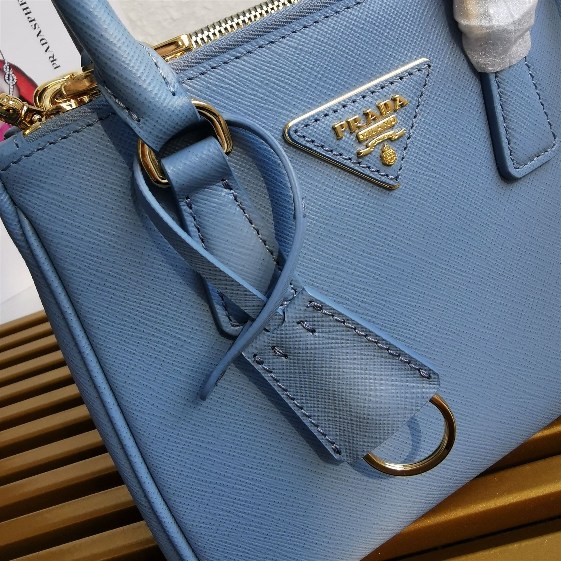Pra*a mini galleria bag in light blue saffiano leather