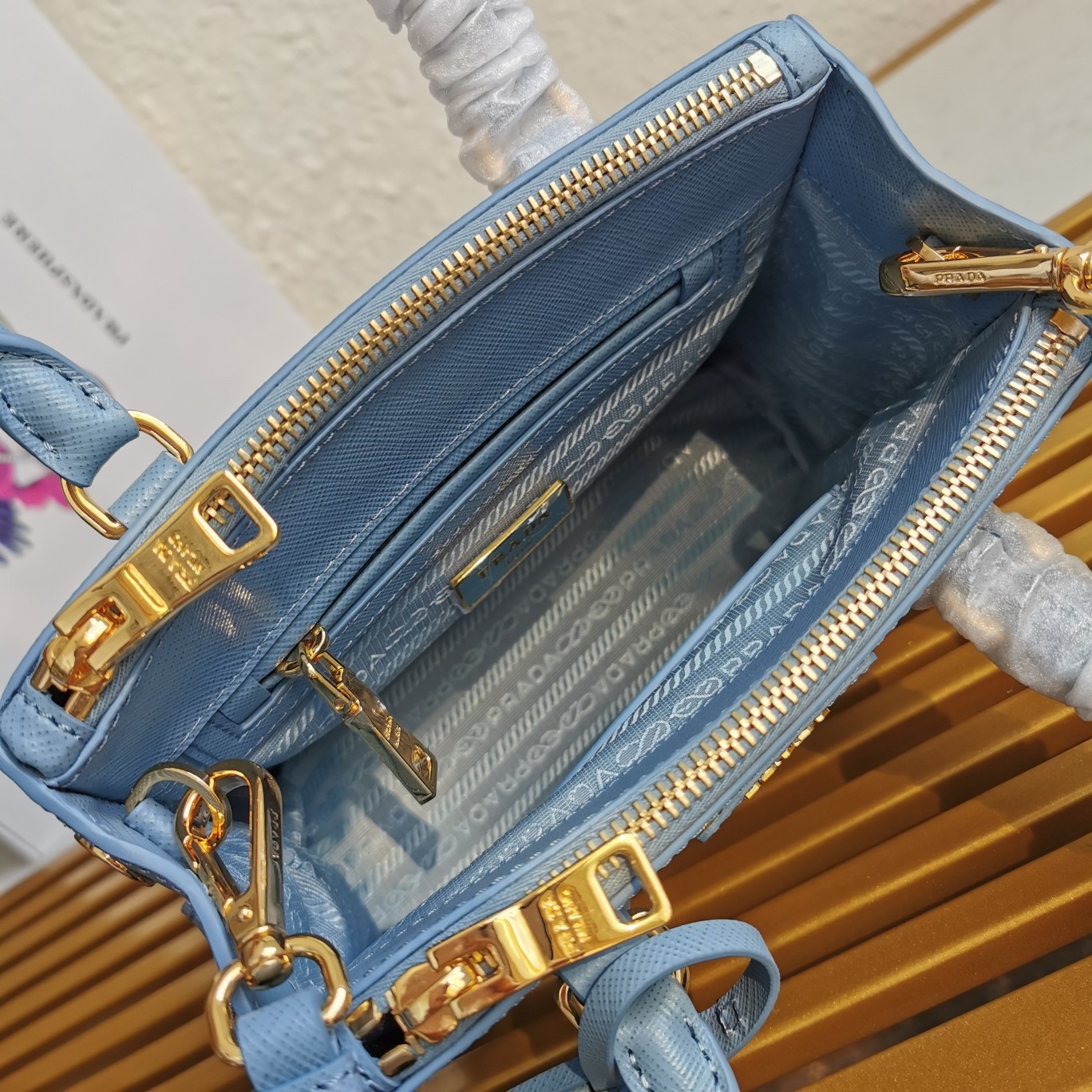 Pra*a mini galleria bag in light blue saffiano leather