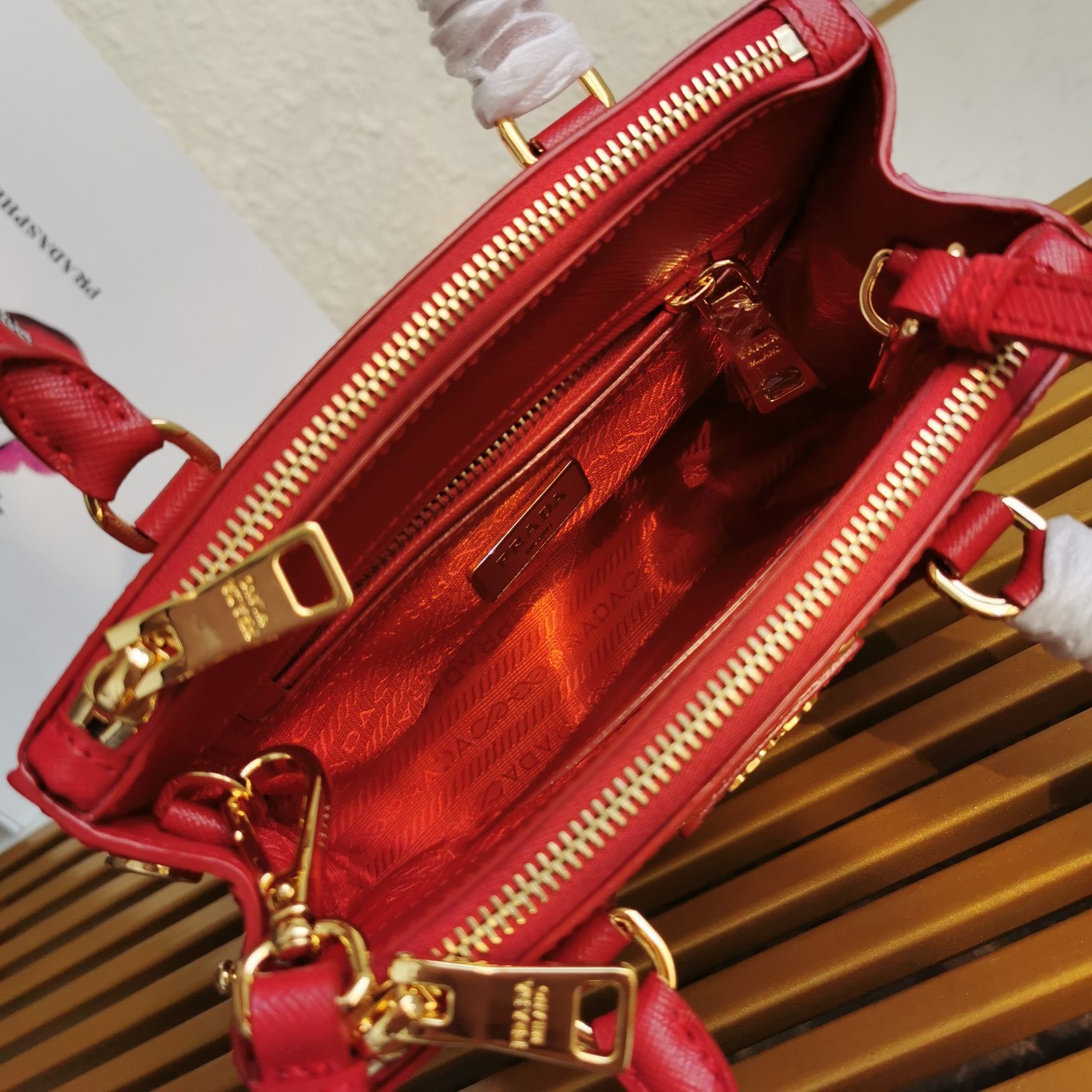 Pra*a mini galleria bag in red saffiano leather