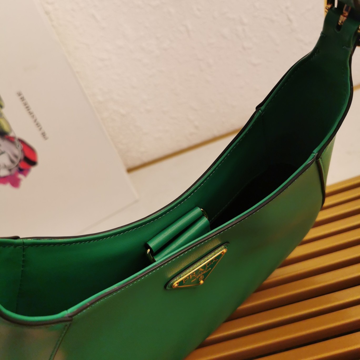 Pra*a shoulder bag in green leather