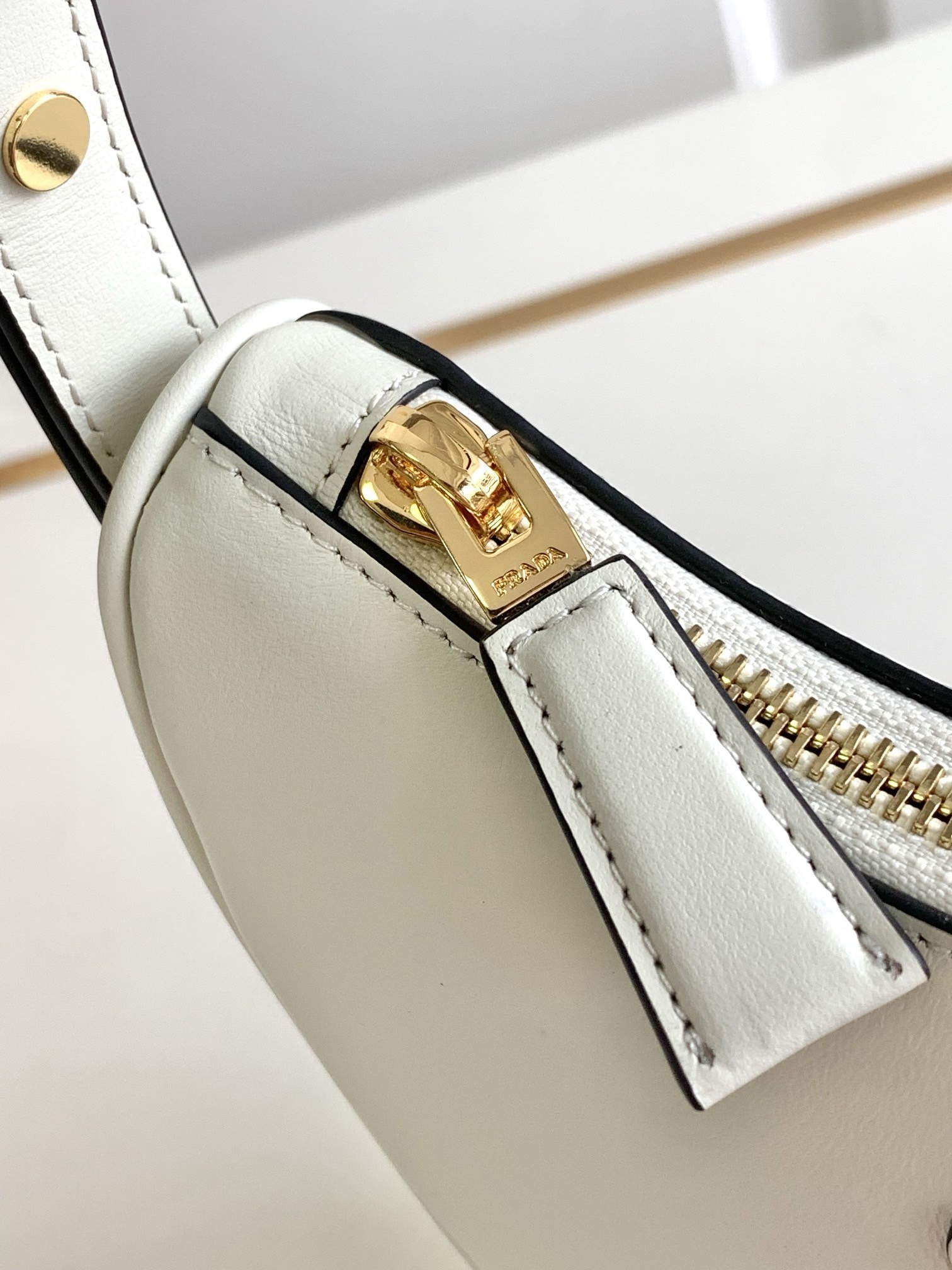 Pra*a arque mini shoulder bag in white leather