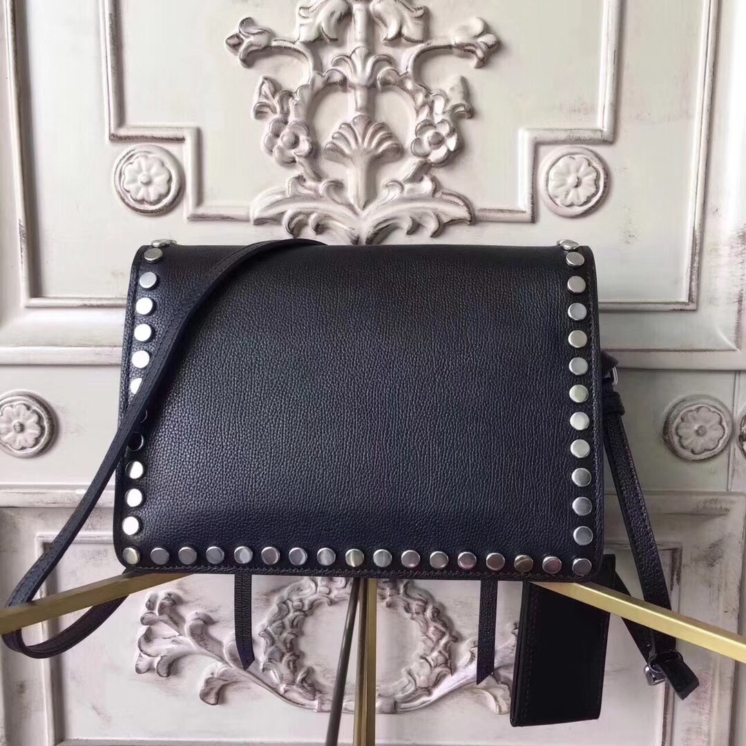 Pra*a etiquette bag in black calfskin with metal stud trim