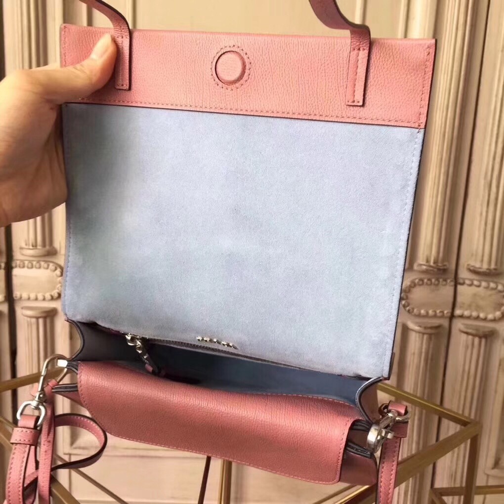 Pra*a etiquette bag in pink calfskin with metal stud trim
