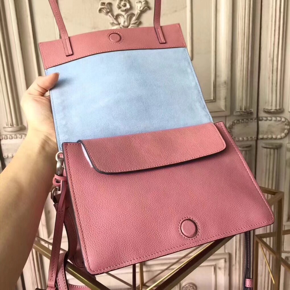 Pra*a etiquette bag in pink calfskin with metal stud trim