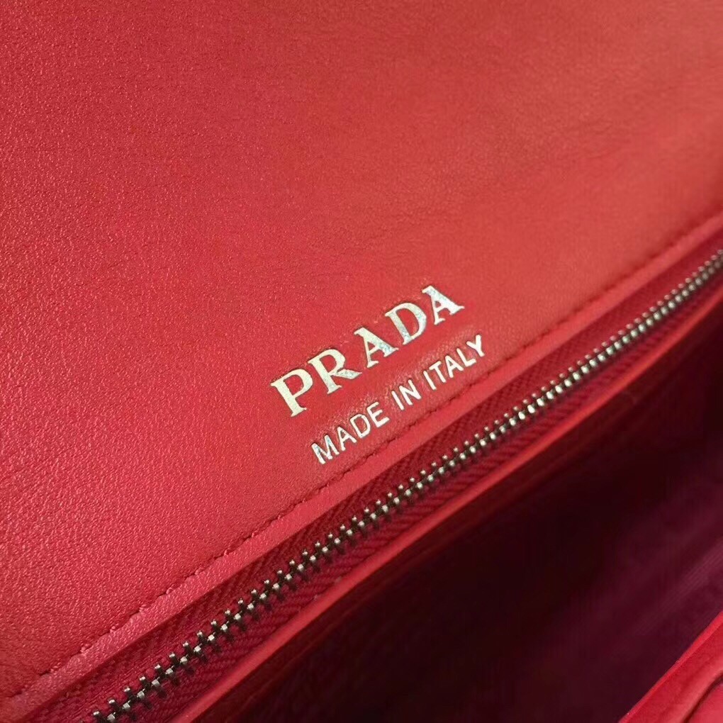 Pra*a diagramme flap bag in red calfskin