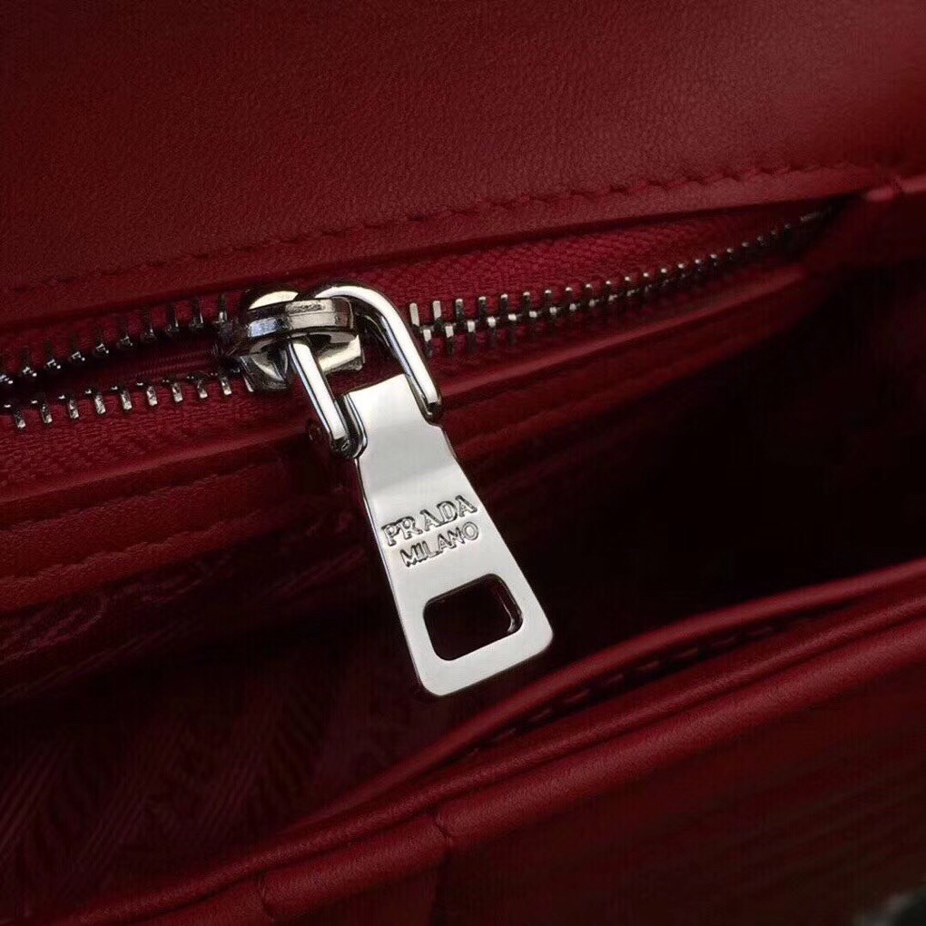 Pra*a diagramme flap bag in red calfskin