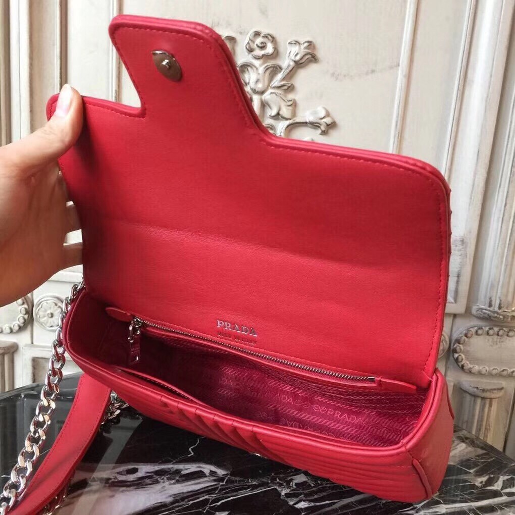 Pra*a diagramme flap bag in red calfskin