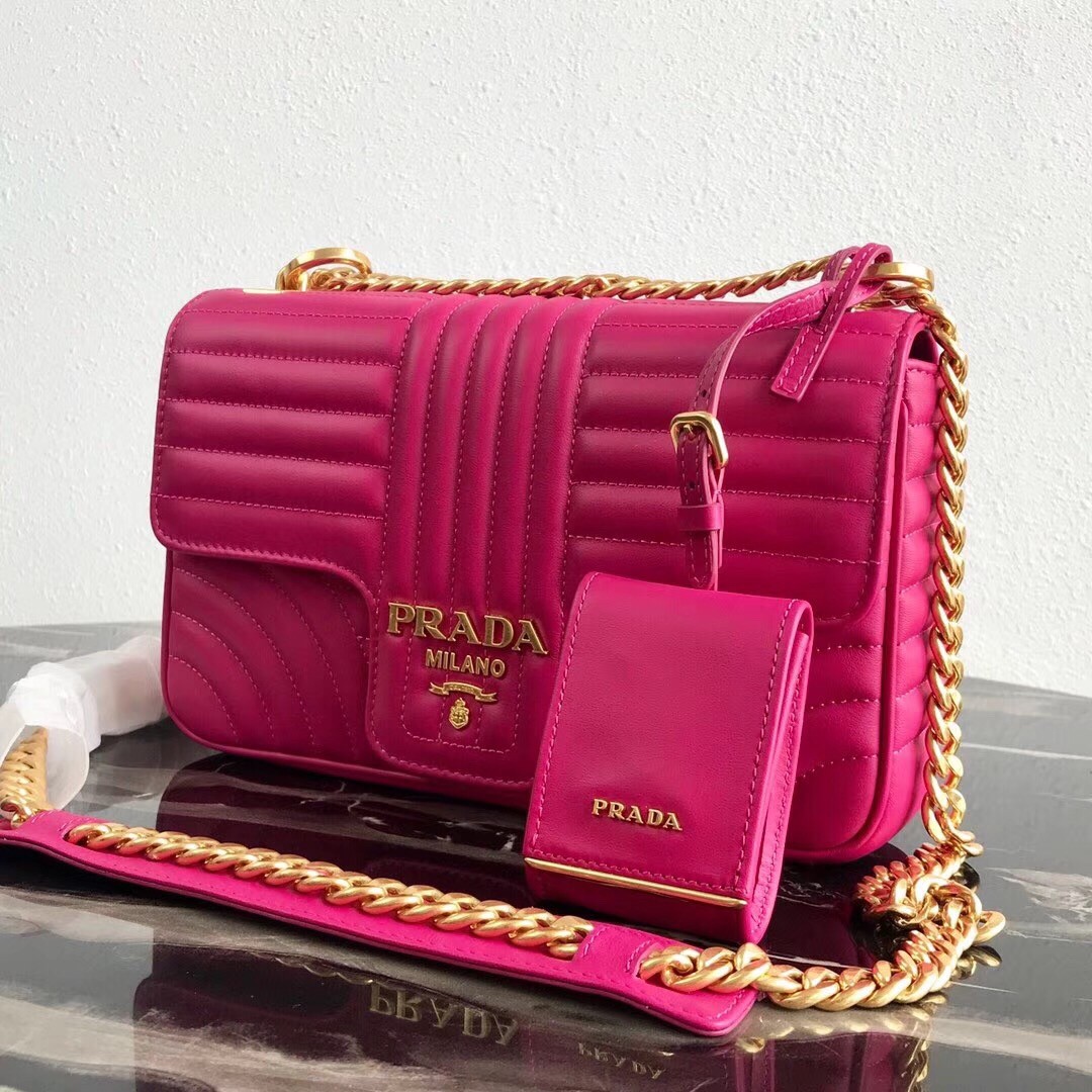 Pra*a medium diagramme flap bag in rose red calfskin
