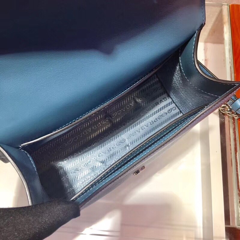 Pra*a monochrome flap bag in blue saffiano leather