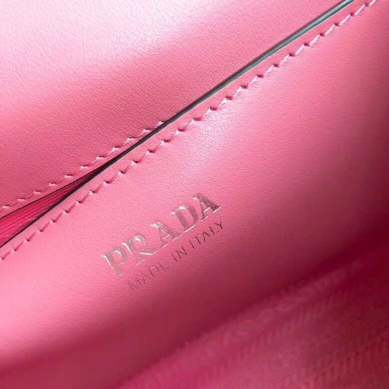 Pra*a monochrome flap bag in petal pink saffiano leather
