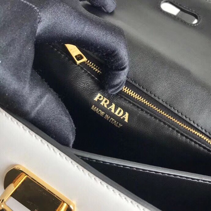 Pra*a belle shoulder bag in black/white calfskin