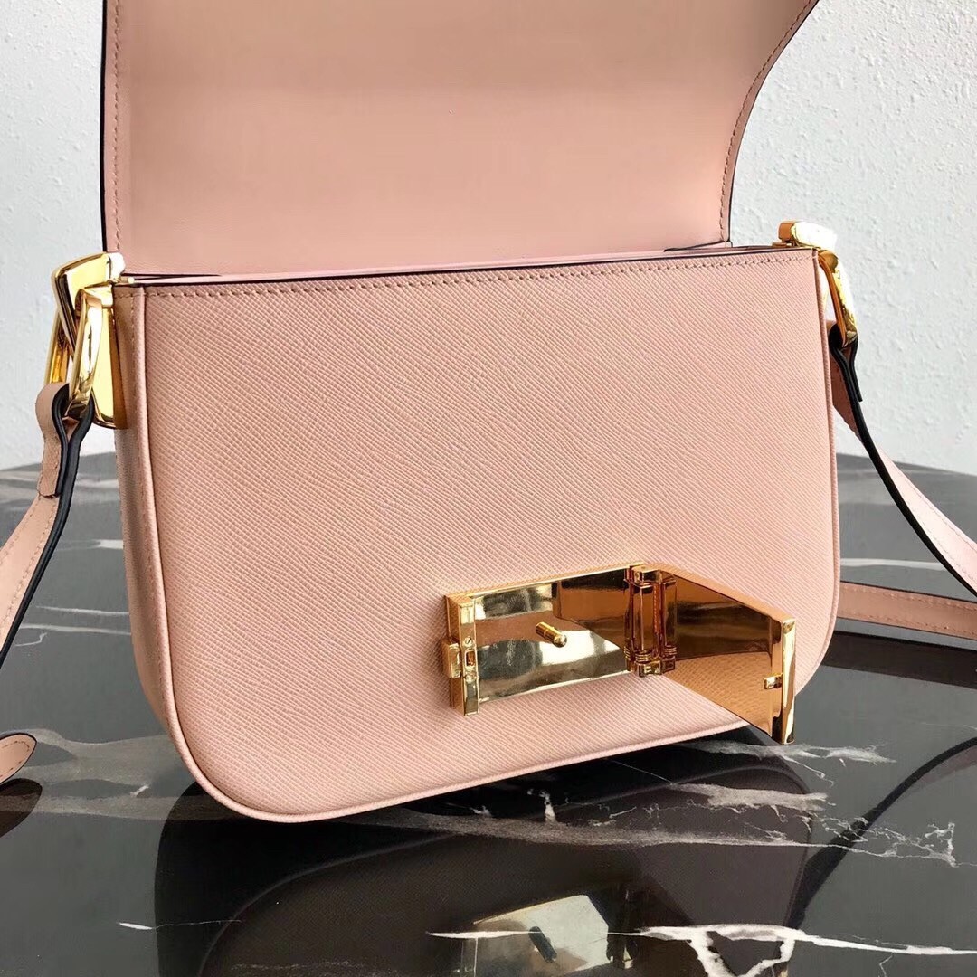 Pra*a embleme bag in powder pink saffiano leather
