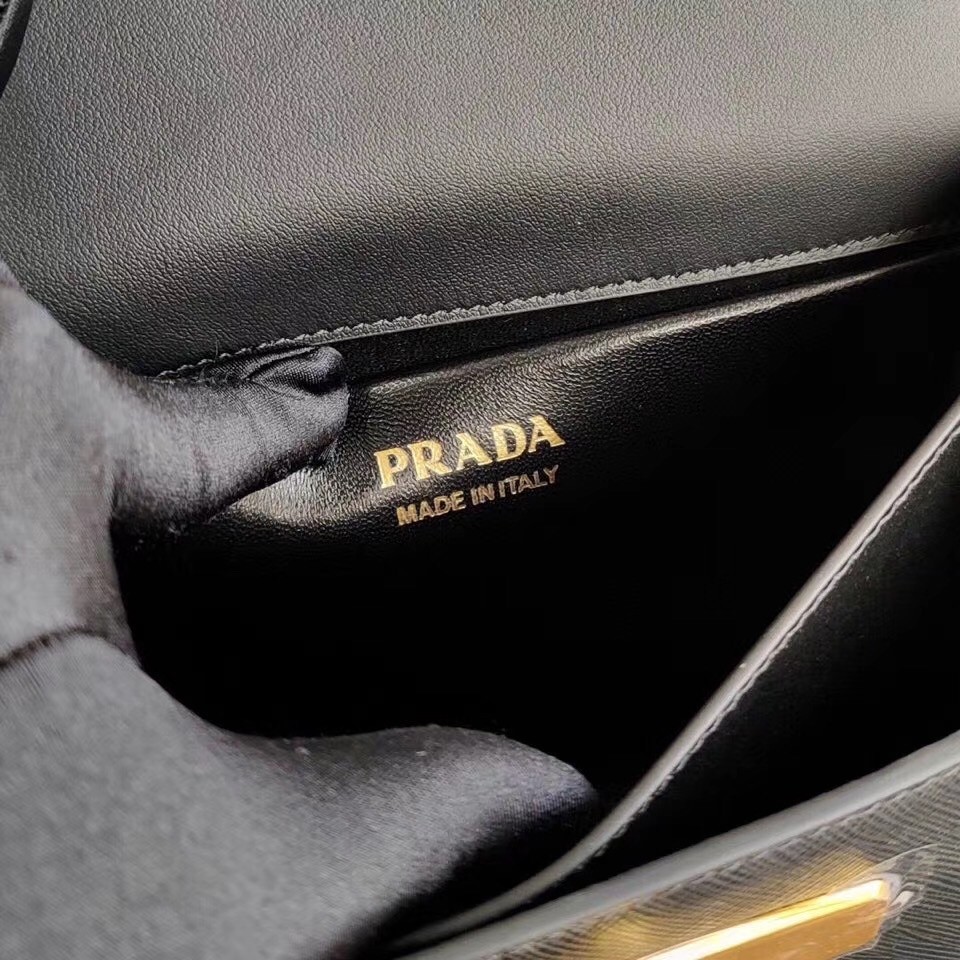 Pra*a symbole shoulder bag in black saffiano leather