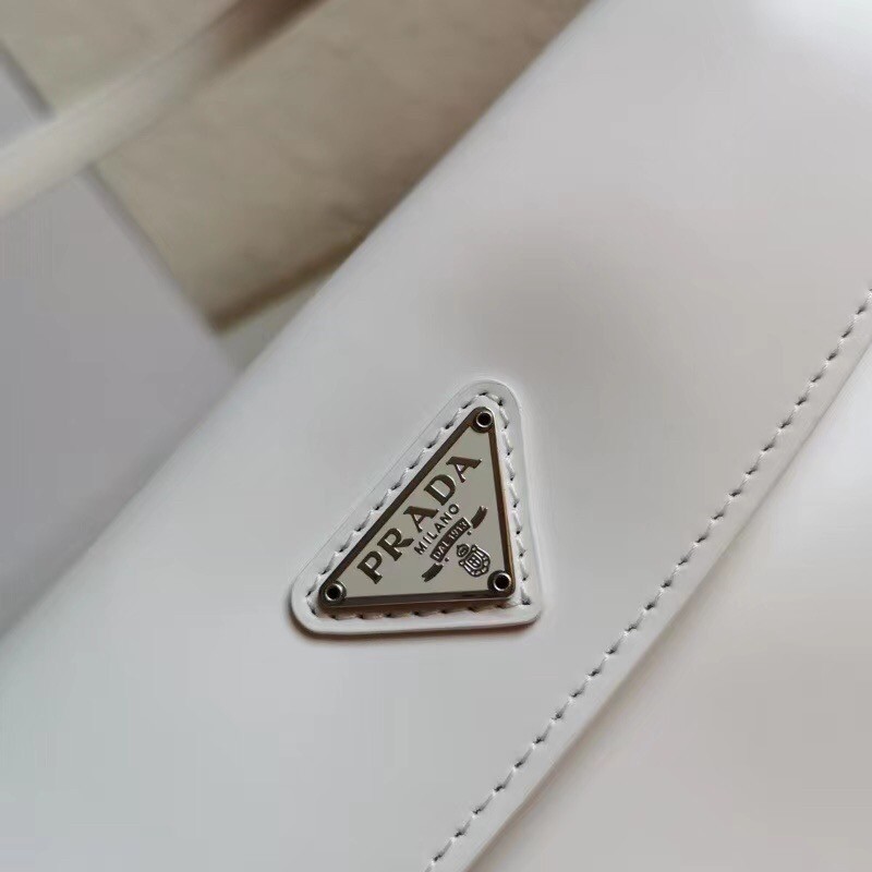 Pra*a white brushed leather cleo shoulder bag with flap