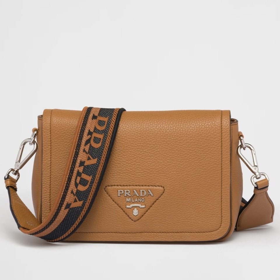 Pra*a flap shoulder bag in brown grained leather