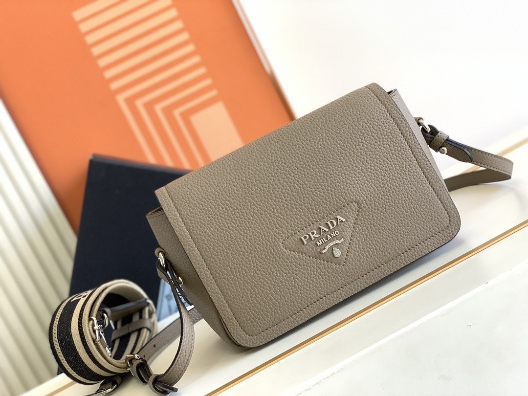 Pra*a flap shoulder bag in grey grained leather