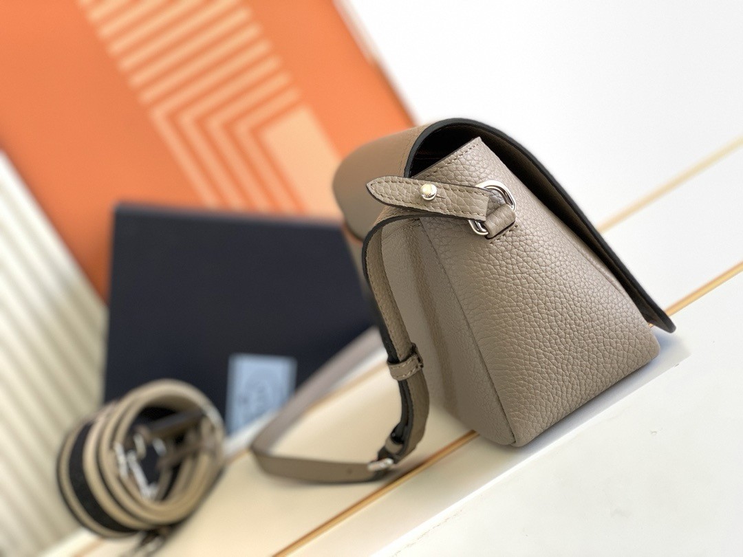 Pra*a flap shoulder bag in grey grained leather