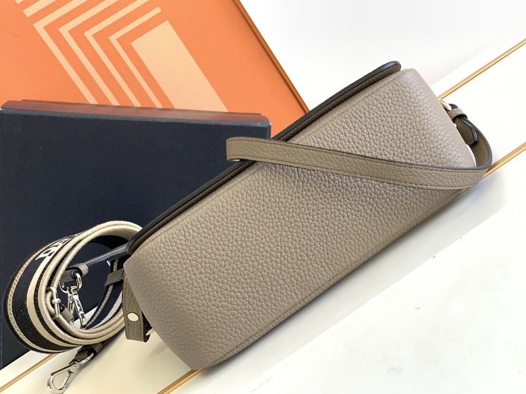 Pra*a flap shoulder bag in grey grained leather