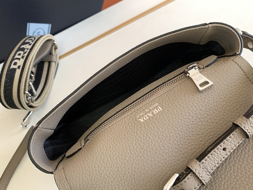 Pra*a flap shoulder bag in grey grained leather