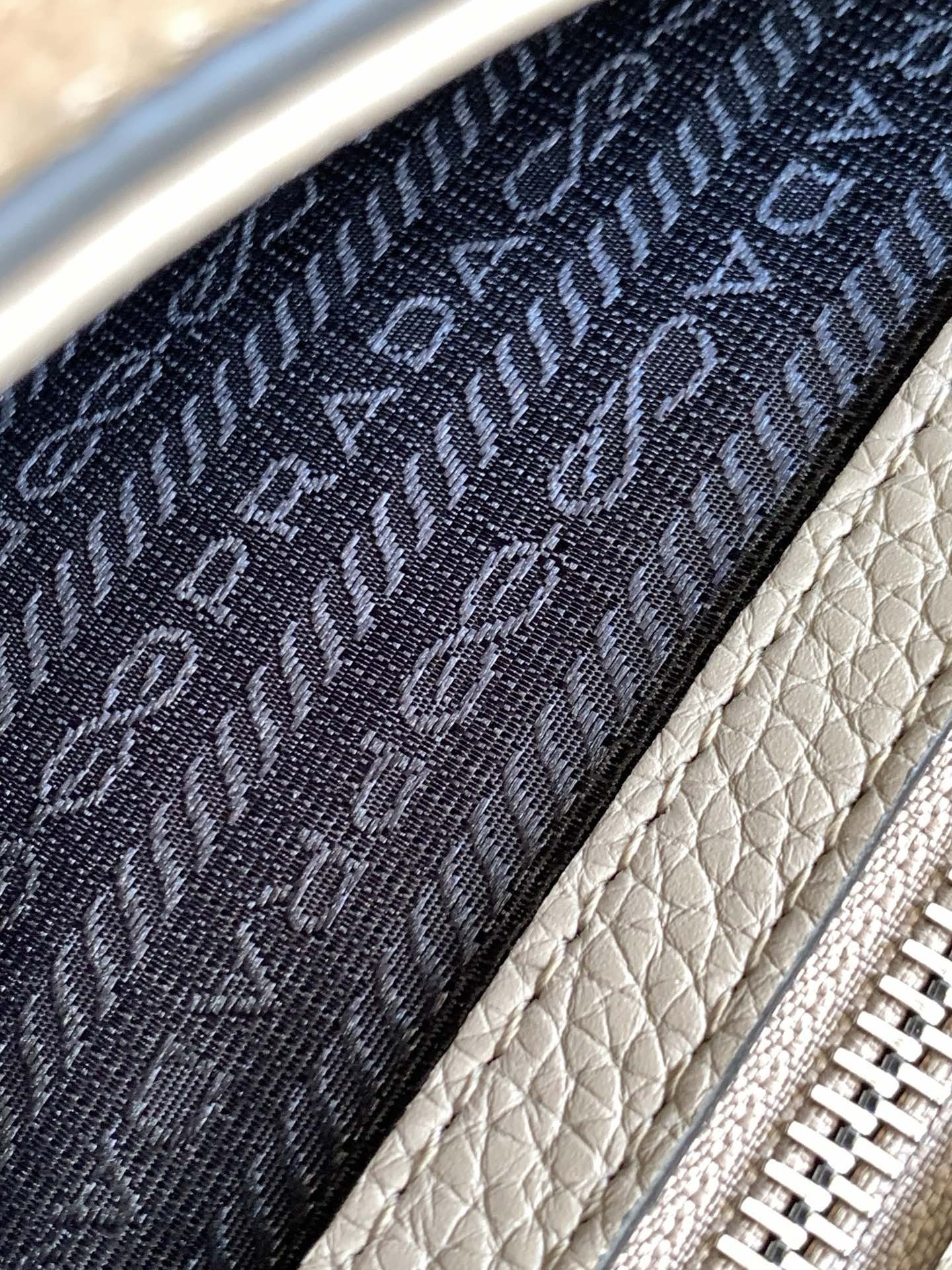 Pra*a flap shoulder bag in grey grained leather