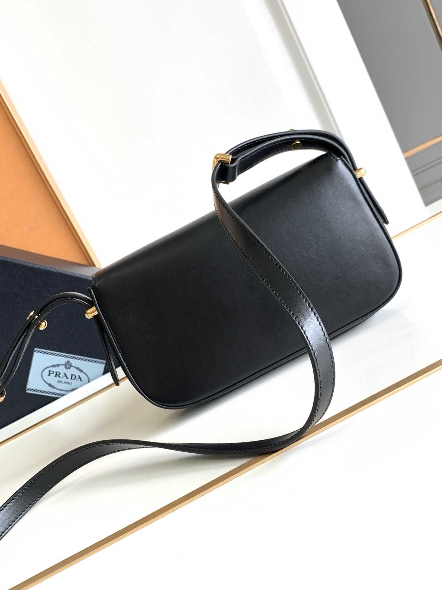 Pra*a shoulder bag in black smooth calfskin